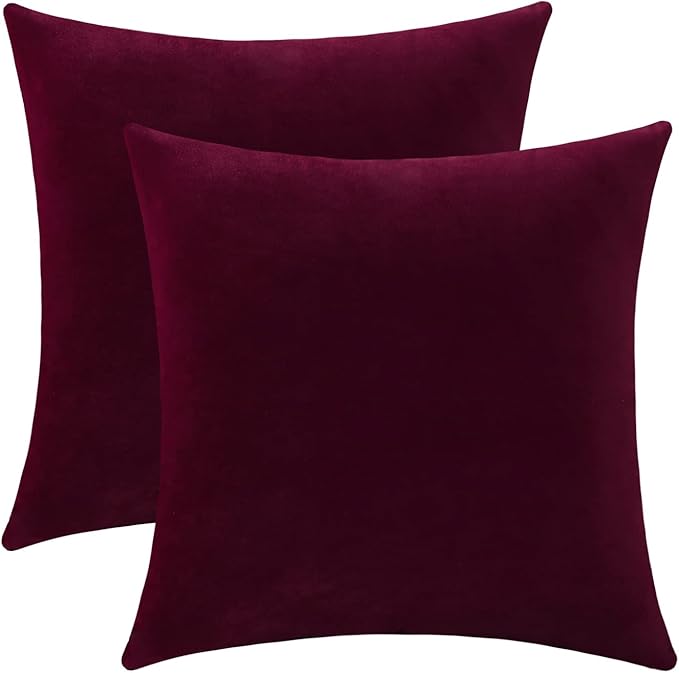 Burgundy red velvet pillow covers, set of 2, 14x14 inches, add cozy elegance to sofa or bedroom decor.