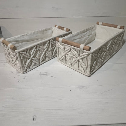 Handwoven macrame storage baskets in ivory white, featuring wooden handles, perfect for bathroom or bedroom organization.