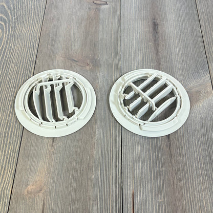 White AC air vent louvers for Ford Explorer and Lincoln MKT, 2 pack, on wooden surface, ideal for 2011-2019 models.
