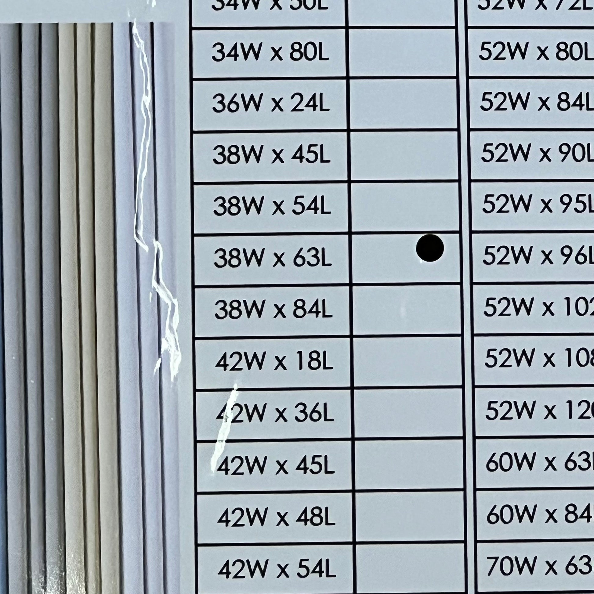 Curtain size chart for ChrisDowa blackout curtains, displaying various dimensions including 38W x 63L, ideal for bedrooms.