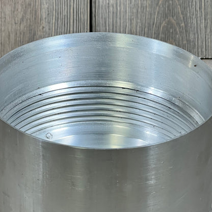 Close-up of Mallofusa fuel filter housing for 6.7L Powerstroke Diesel, showcasing threaded interior details.