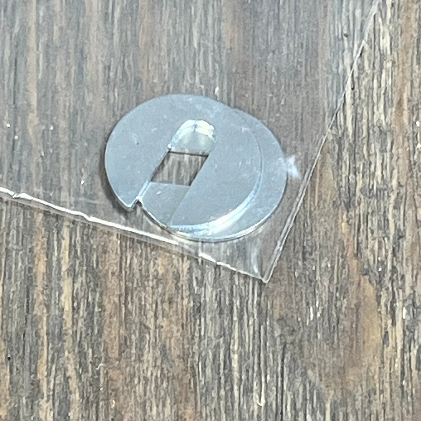 Silver metal washer component from Hihitomorrow R0457400 wire harness assembly for Zodiac Jandy heaters.