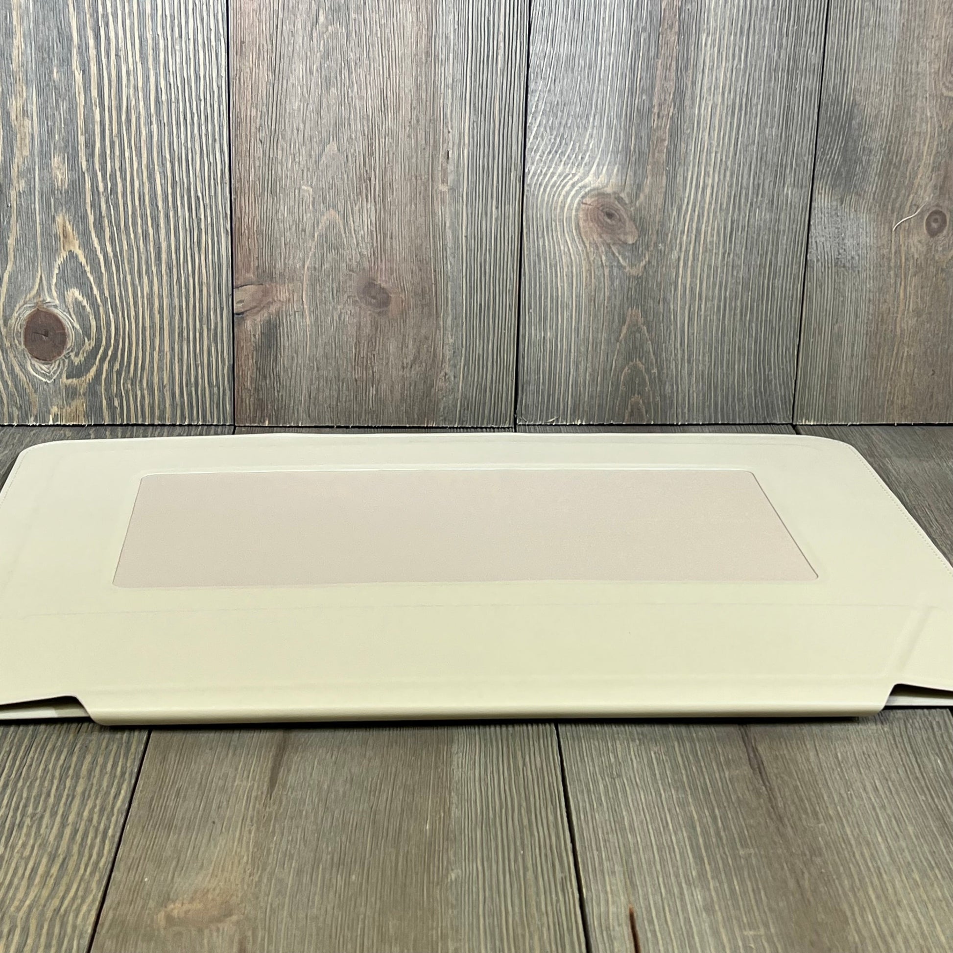 Ultra-slim MOFT laptop sleeve in Beach White, showcasing sleek design for 15"-16" MacBook with expandable storage.