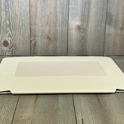 Ultra-slim MOFT laptop sleeve in Beach White, showcasing sleek design for 15"-16" MacBook with expandable storage.