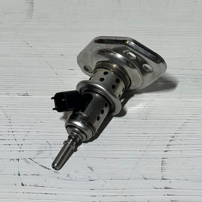 Diesel Exhaust Fluid Injector compatible with Ram and Ford Super Duty trucks, showcasing durable metal design.
