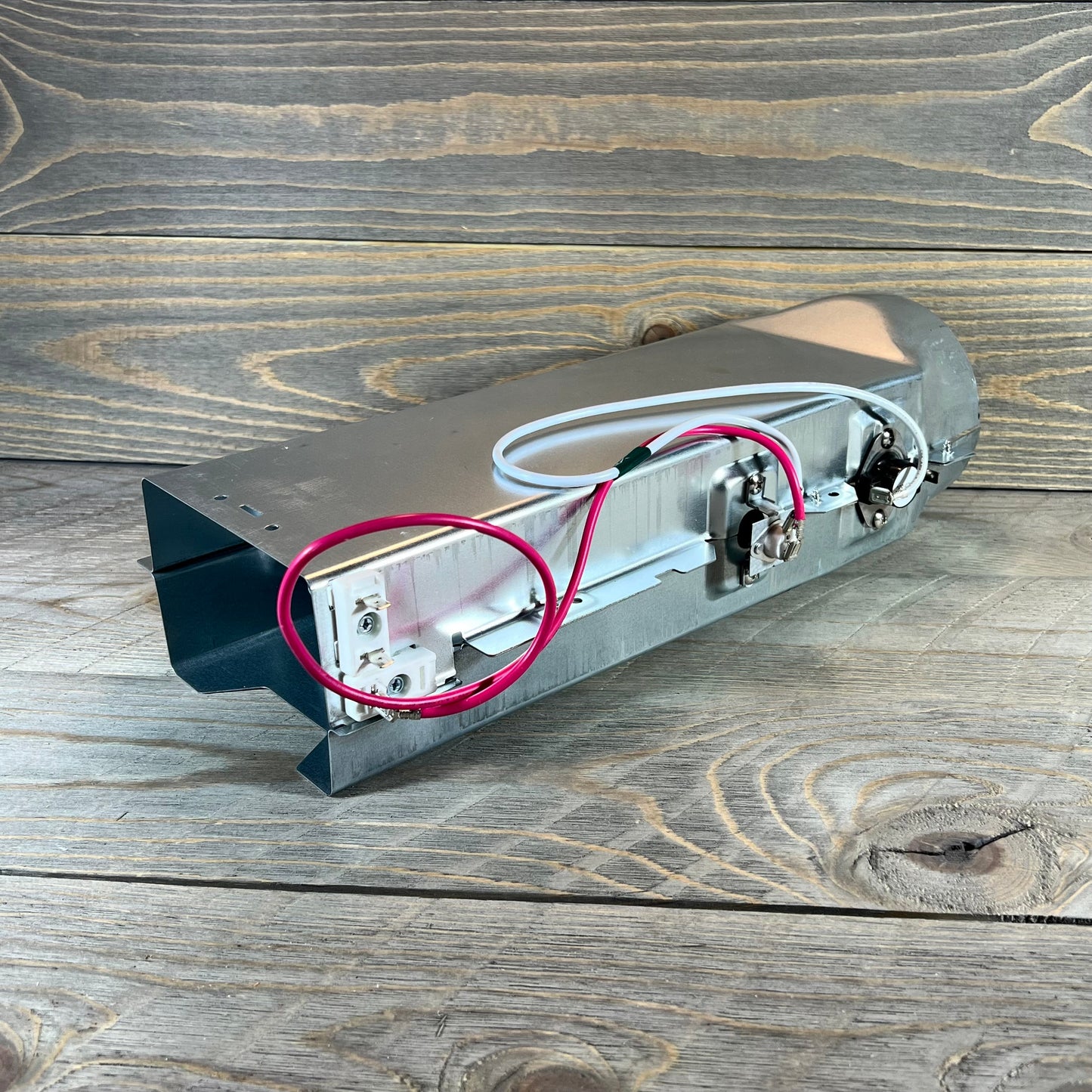 Stainless steel dryer heating element with red wiring, compatible with LG TROMM and Kenmore Elite models.