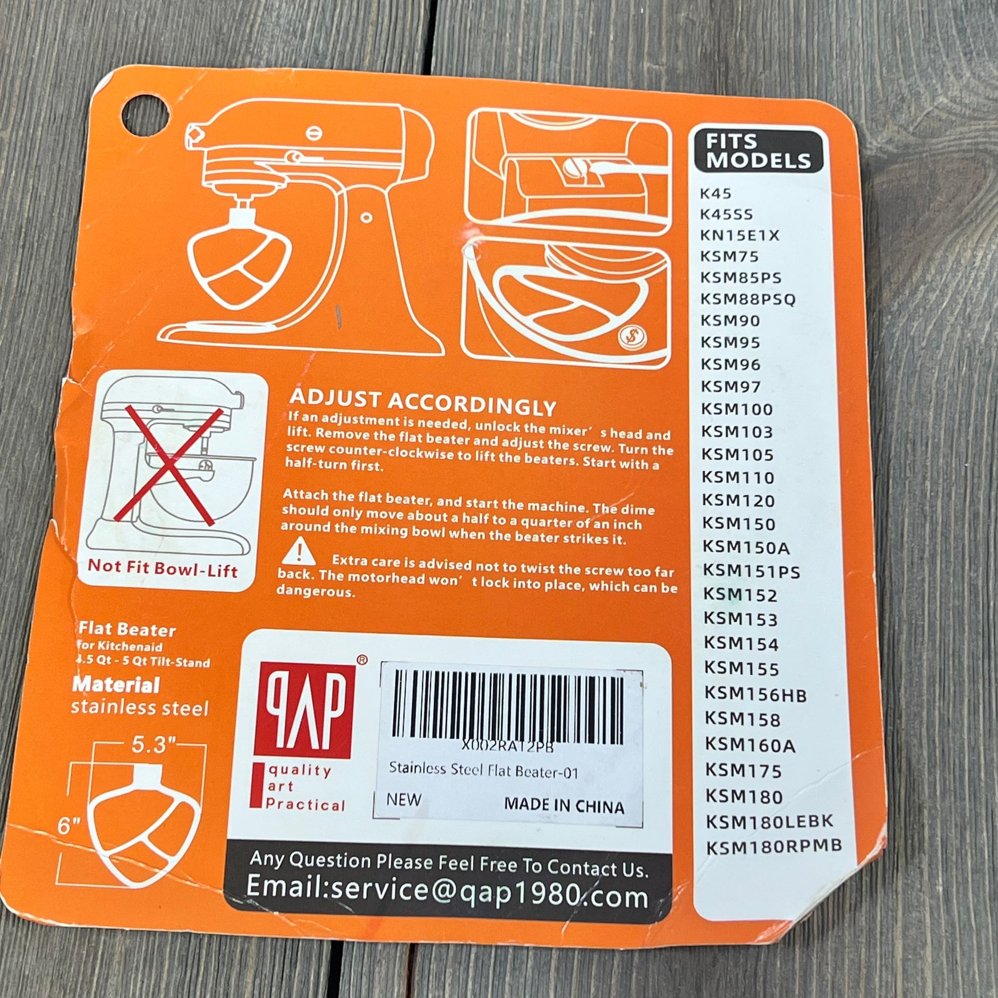 Stainless steel flat beater packaging for KitchenAid mixers, showing model compatibility and adjustment instructions.