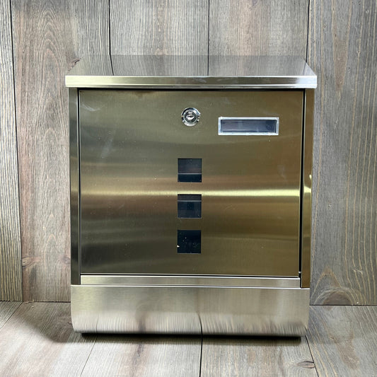 Stainless steel wall-mounted mailbox with key lock, featuring a newspaper compartment and sleek silver finish.