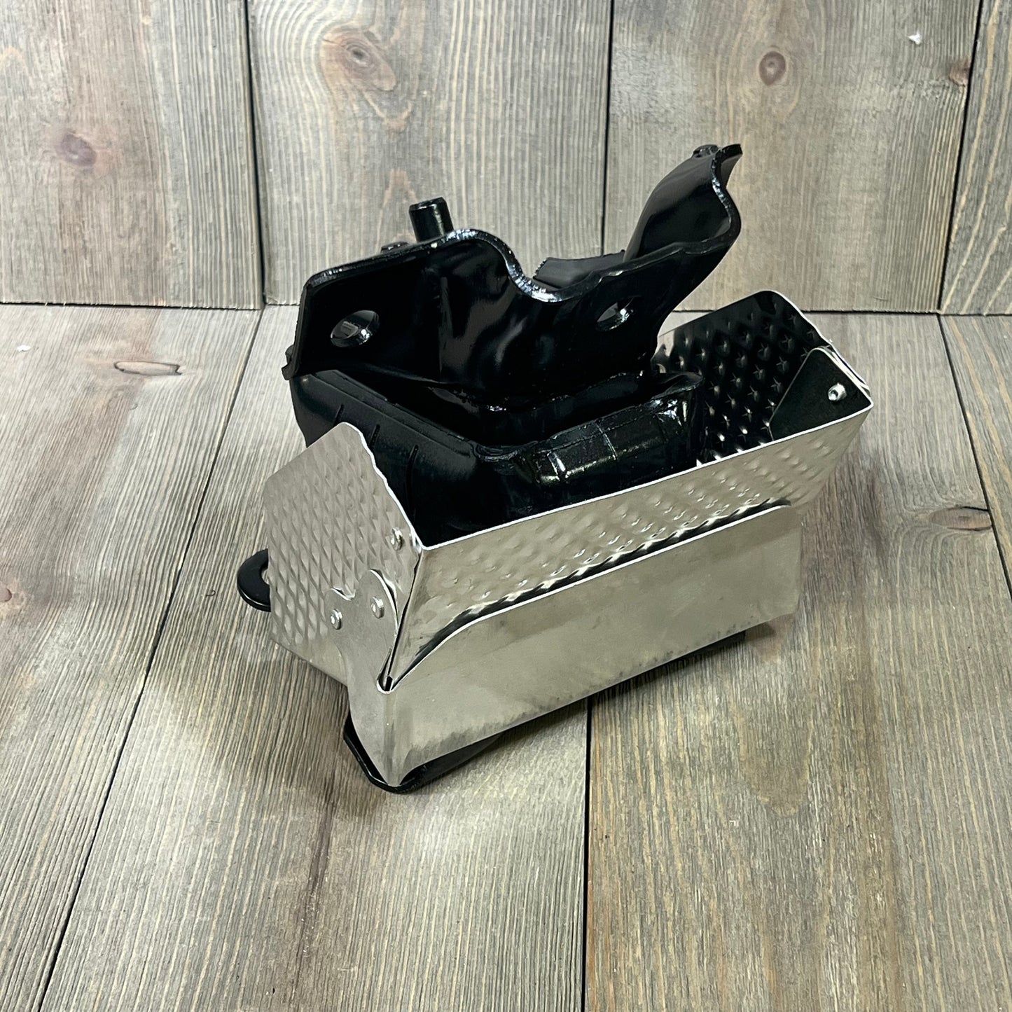 Engine motor mount for 2007-2014 Tahoe and Silverado, showcasing durable metal construction and black finish.