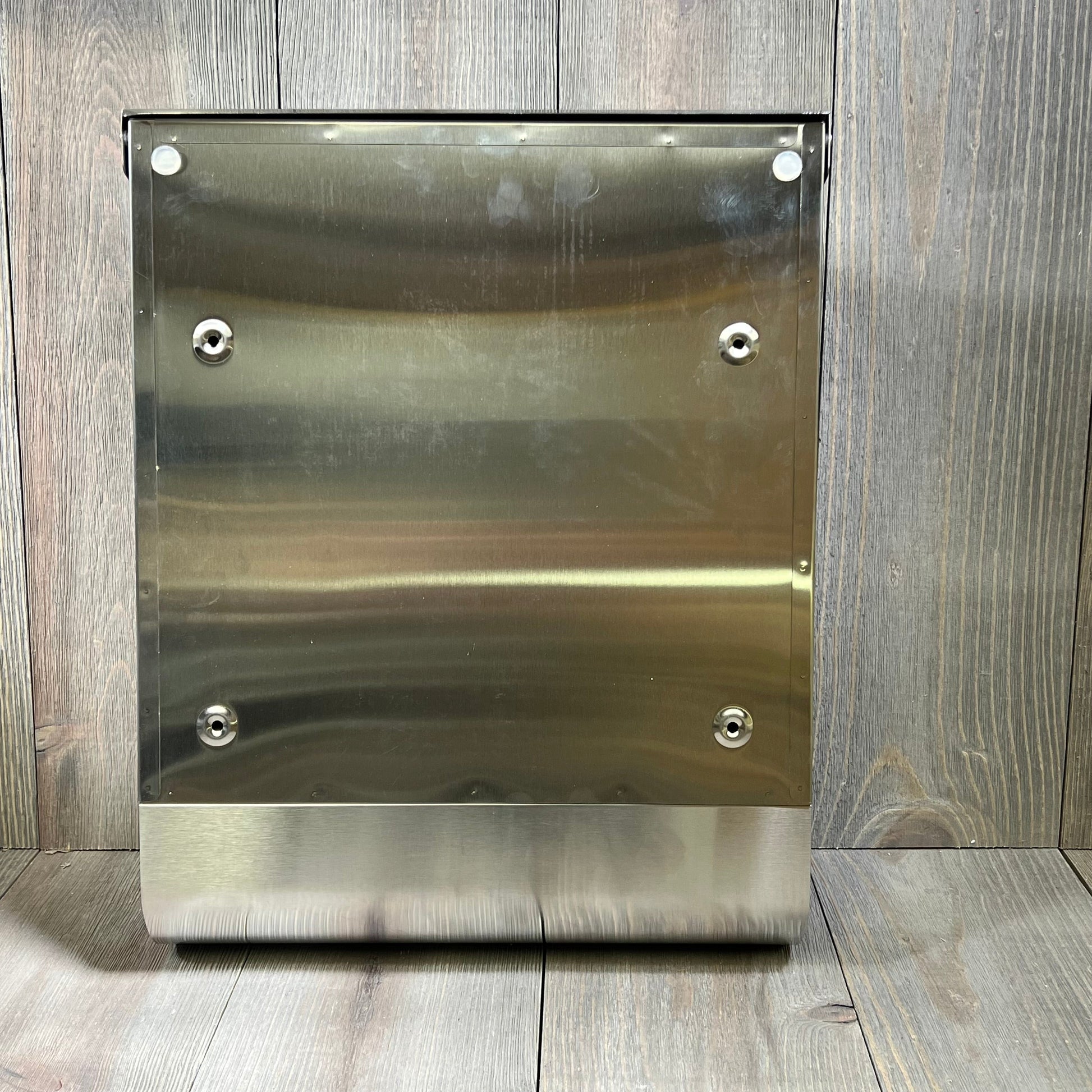 Wall-mounted stainless steel mailbox with key lock, featuring a sleek silver finish and large capacity for mail and newspapers.