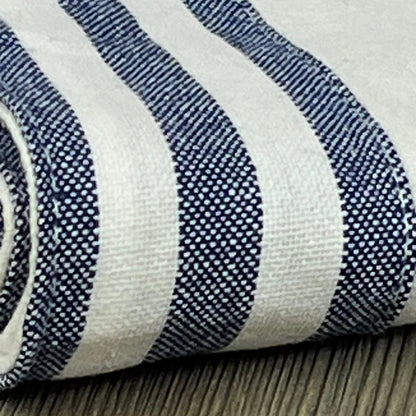 White hemstitch table runner with blue stripe edges, crafted from 100% cotton for durability and elegance.