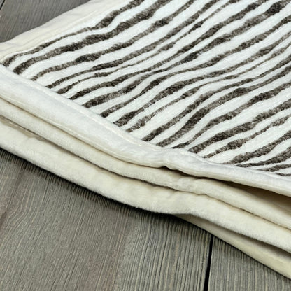 Soft chenille striped brown pillow cover on wooden surface, ideal for couch or bed decor, 18x18 inches.