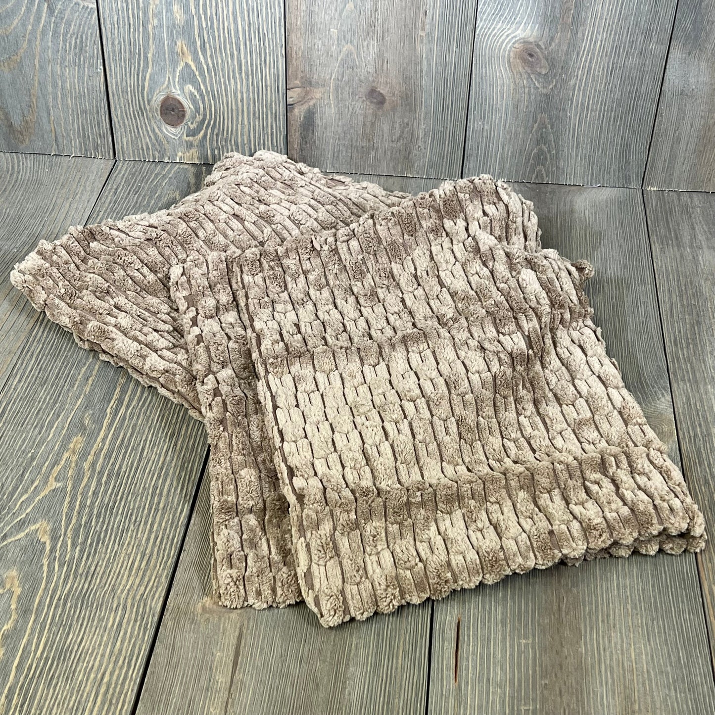 Light brown corduroy lumbar pillow covers on rustic wooden floor, ideal for farmhouse and boho decor, 12x20 inch.