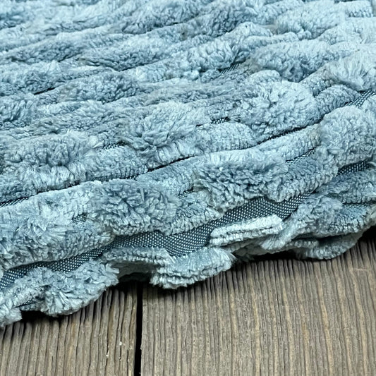 Soft corduroy texture of blue-grey Kevin Textile throw pillow cover on wooden surface, ideal for boho farmhouse decor.