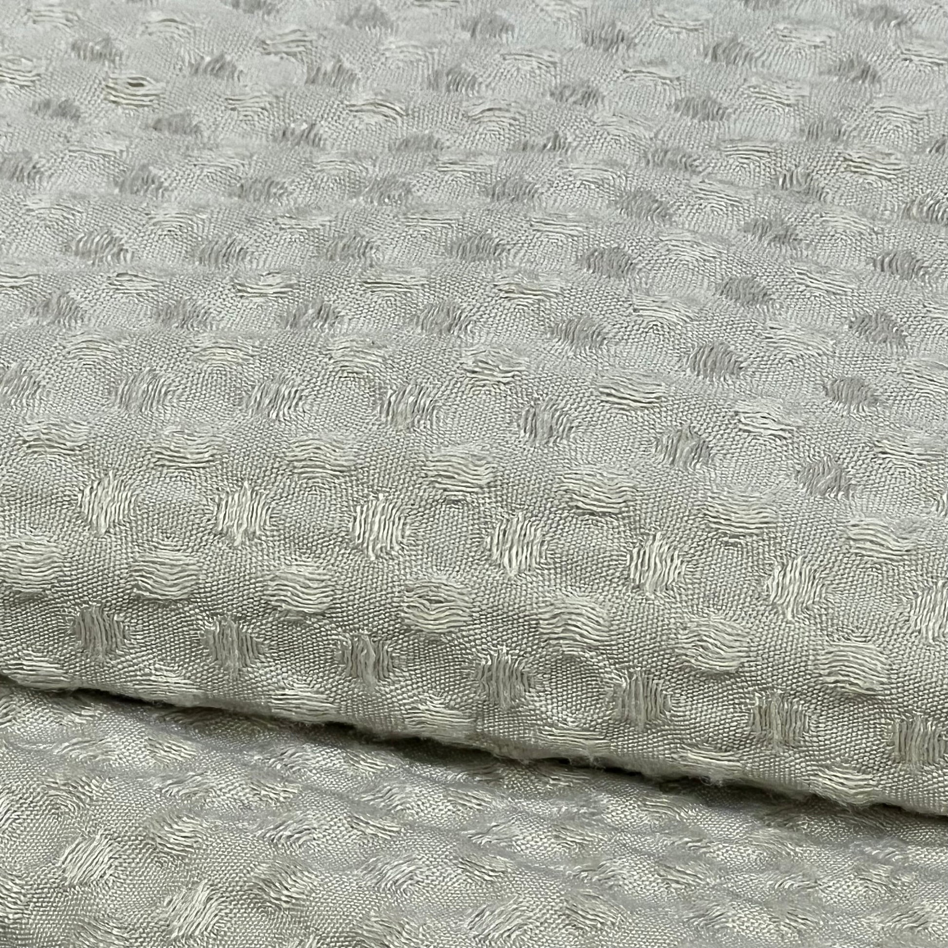 Ultra soft waffle weave pillow shams in light khaki, showcasing intricate texture and breathable fabric.