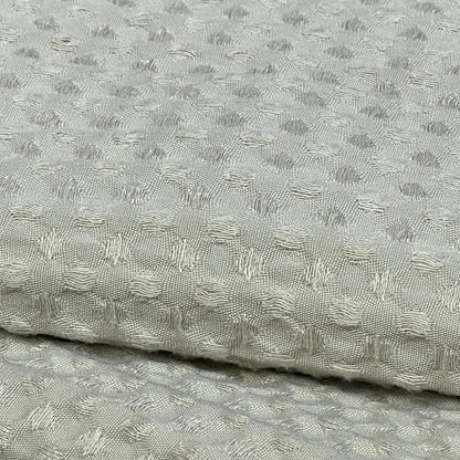 Ultra soft waffle weave pillow shams in light khaki, showcasing intricate texture and breathable fabric.
