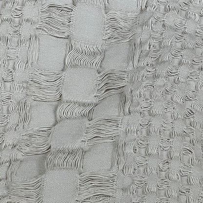 Close-up of PHF 100% cotton waffle weave texture in oatmeal, showcasing elegant and luxurious euro sham design.