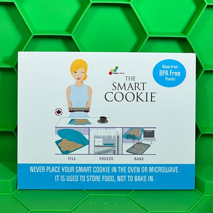 Smart Cookie Tray packaging on a vibrant green hexagonal background, highlighting BPA-free and food storage features.