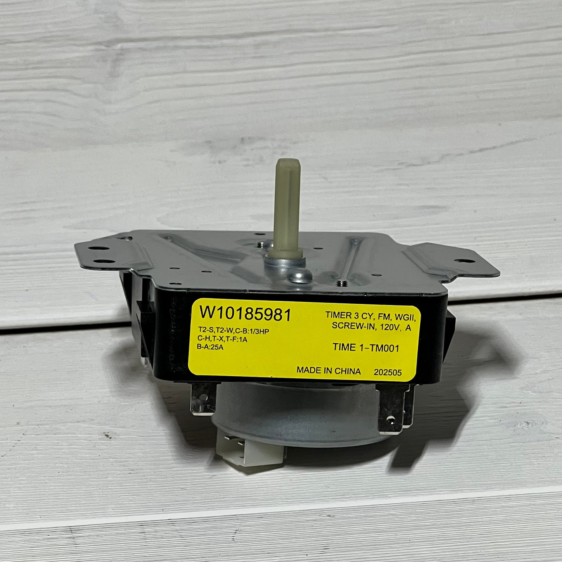 Dryer timer W10185981 replacement part with yellow label, compatible with Whirlpool, Kenmore, Amana models.
