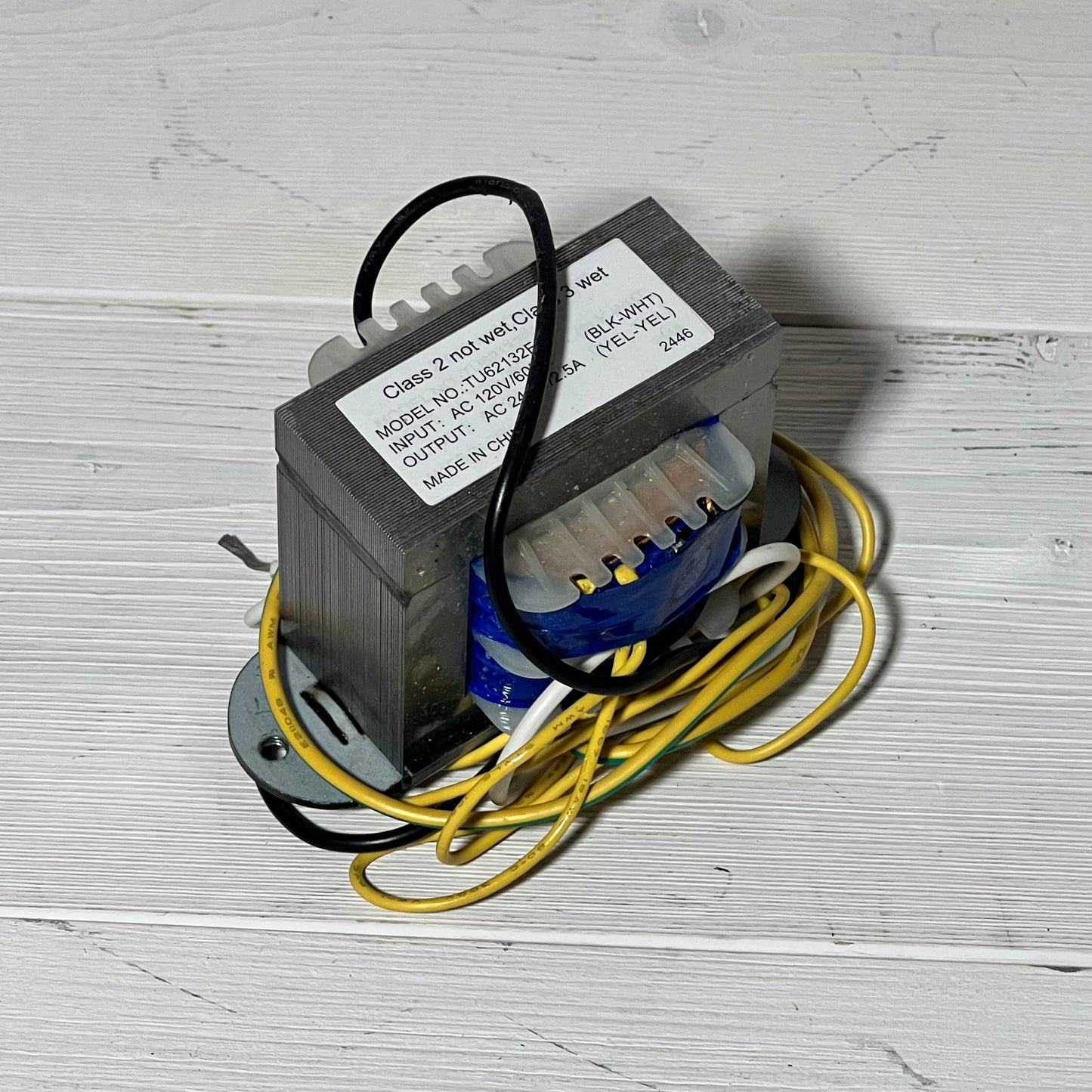 Transformer 1048559326-R0466400 with wiring for Zodiac Jandy AquaLink RS control power centers on white surface.