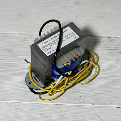 Transformer 1048559326-R0466400 with wiring for Zodiac Jandy AquaLink RS control power centers on white surface.