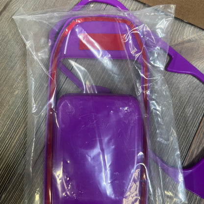 Purple trim kit pieces for Jeep Wrangler JL JLU Gladiator, featuring steering wheel and door handle covers in packaging.