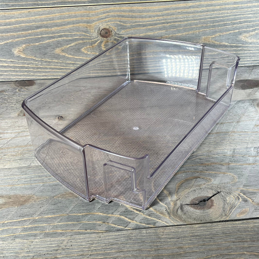Transparent refrigerator door shelf bin for LG and Kenmore models on wooden surface, part number MAN63948502.