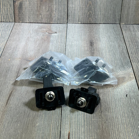 Black Jeep TJ hood latches and catch kits for Wrangler 1997-2006, factory style, on wood background.