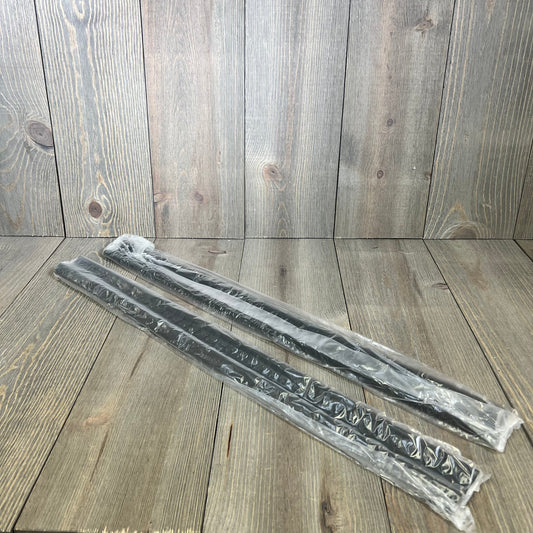 Black all-terrain entry guards in packaging for 1997-2006 Jeep Wrangler TJ/LJ, durable thermoplastic material.