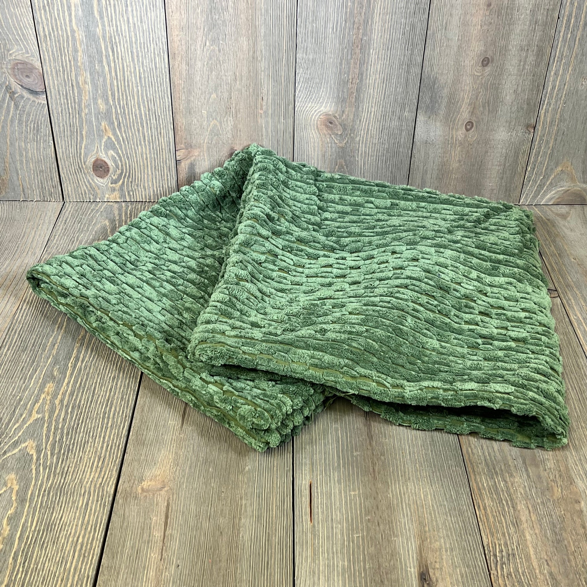 Soft corduroy throw pillow covers in moss green, perfect for boho farmhouse decor on couches, beds, and sofas.