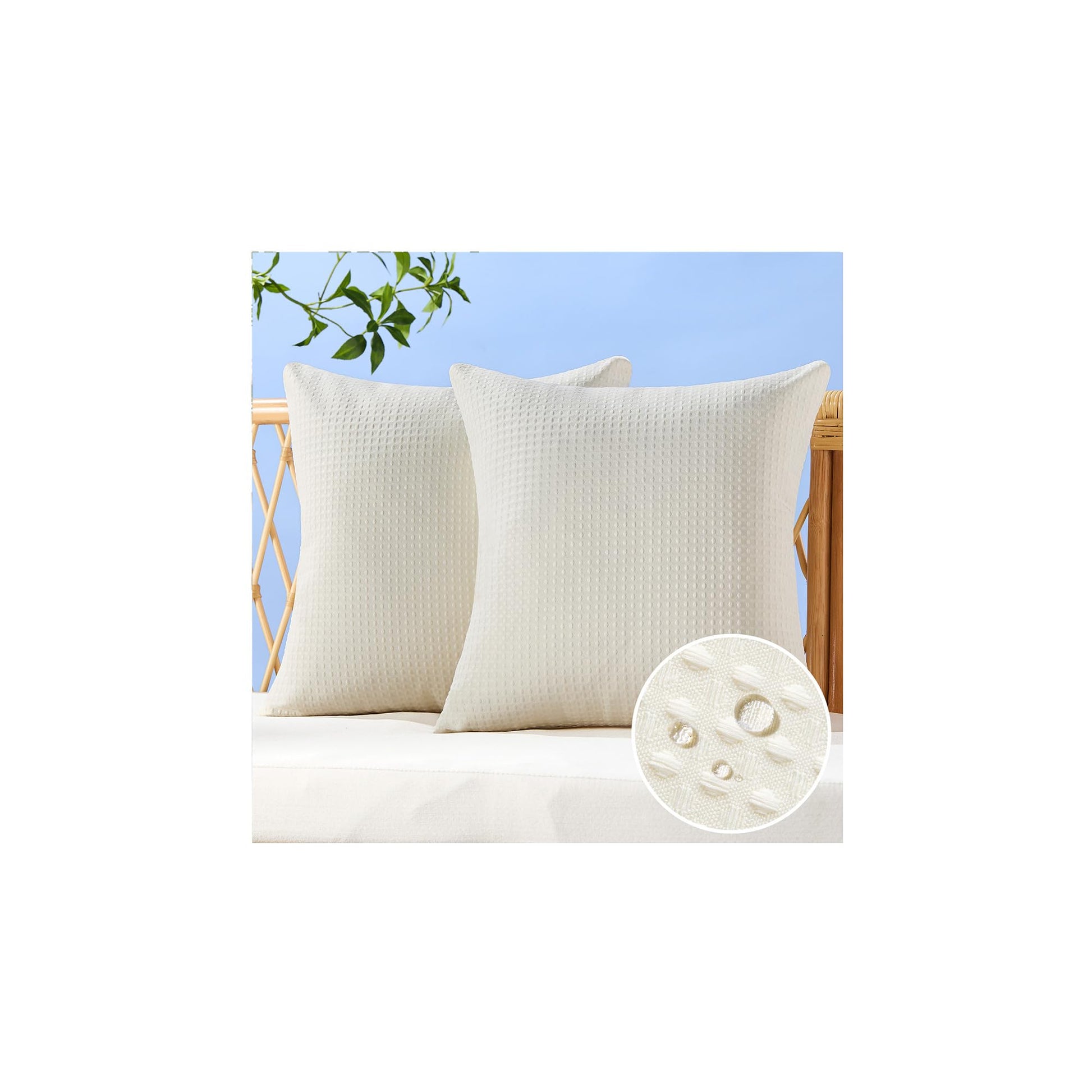 Set of 2 white waffle textured outdoor pillow covers on patio furniture, showcasing waterproof polyester fabric.