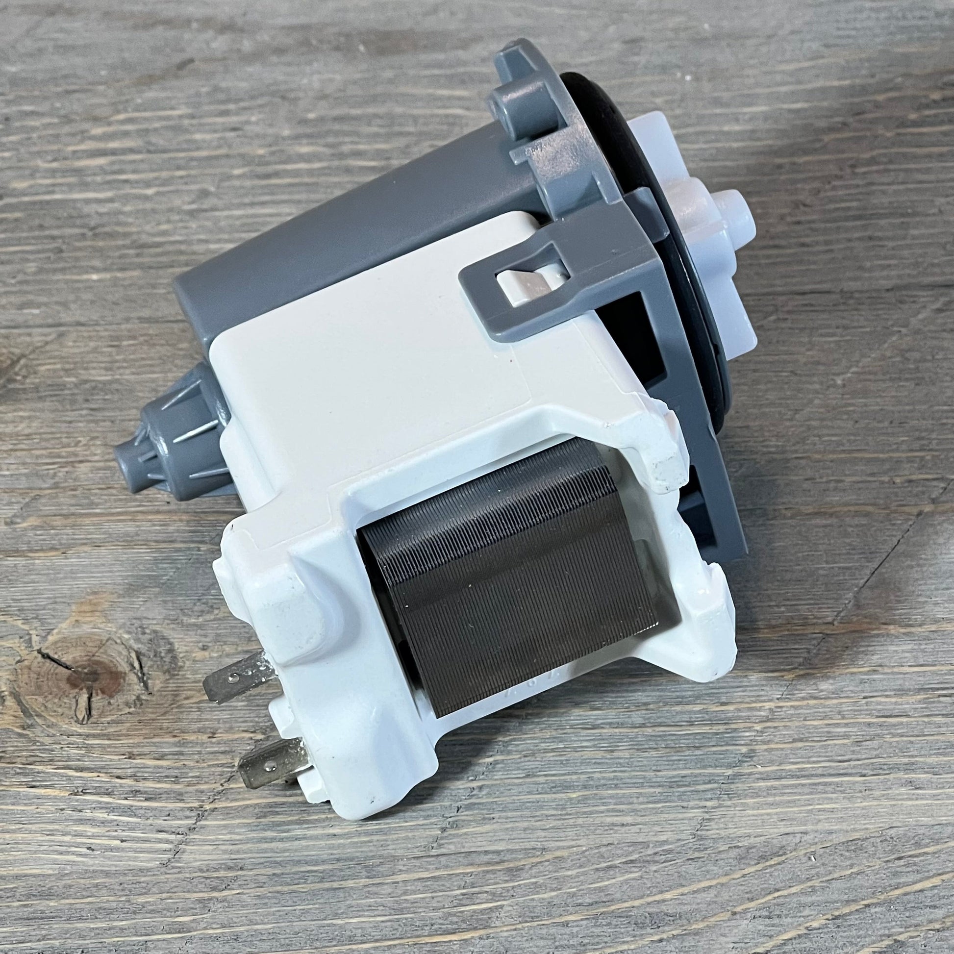 Washer drain pump Supco LP054D with sturdy gray and white casing, compatible with Samsung DC31-00054D models.