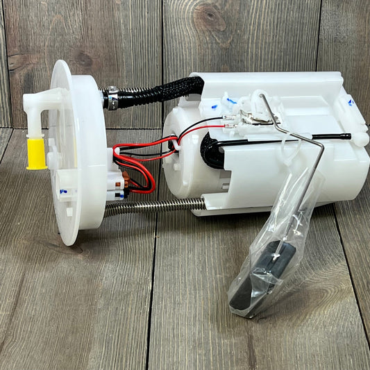 Electric fuel pump assembly for Accord 2013-2017, TLX 2015-2020; robust design with wiring details on wooden background.