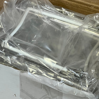 Clear acrylic plate stand packaged with adjustable white wire for secure display of plates and books.