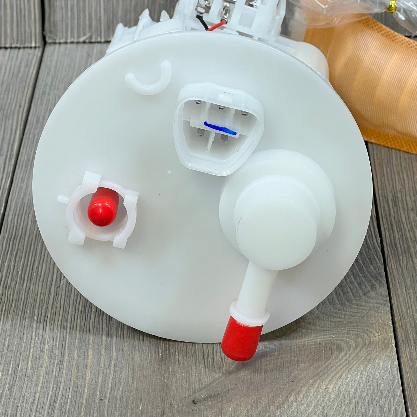 Electric fuel pump module assembly for Toyota Corolla 1.8L 2004-2007, showcasing top connectors and ports.