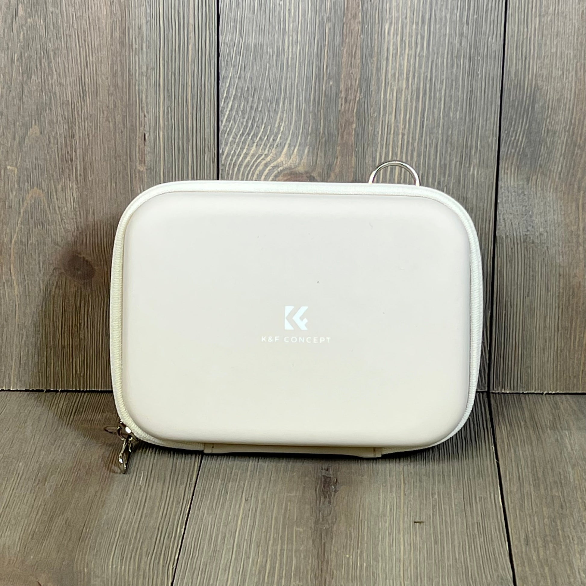 Beige K&F Concept waterproof camera bag, compact and lightweight, ideal for protecting digital cameras.