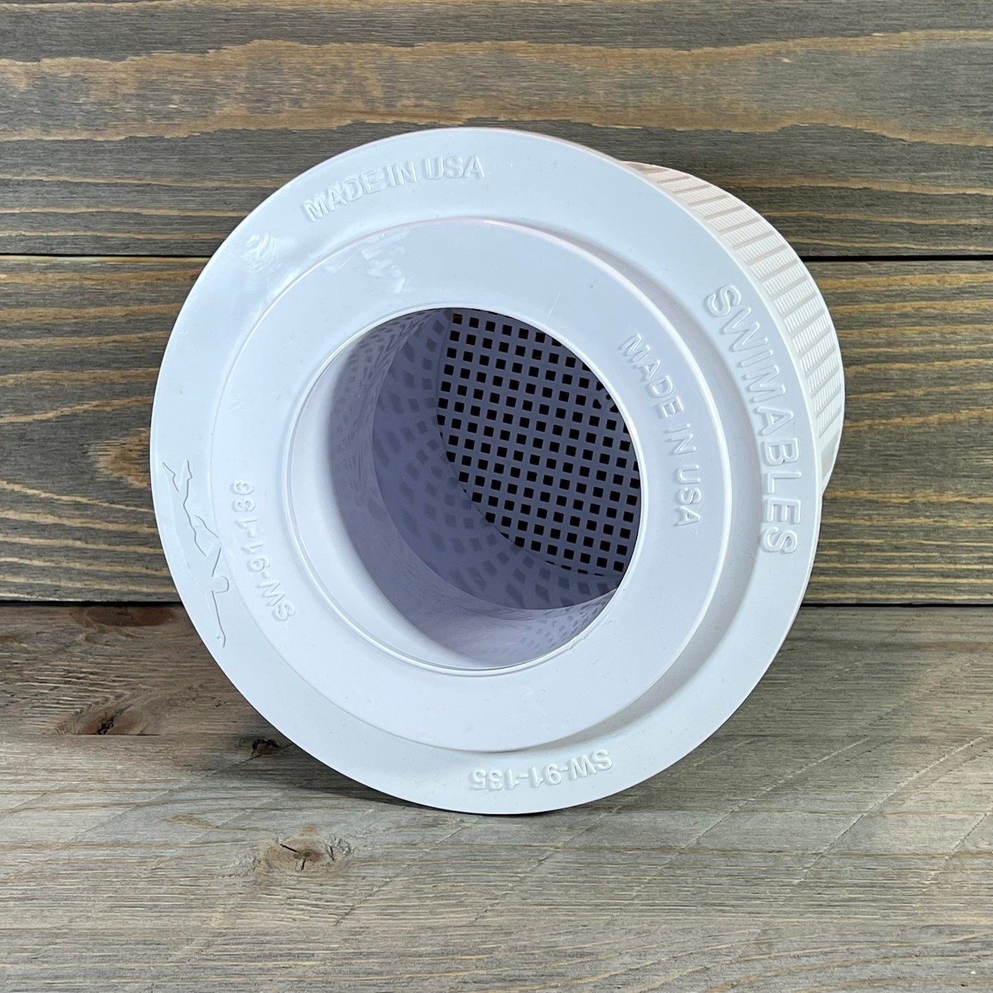 White replacement pool skimmer basket for Pentair Admiral, shown on a wooden surface, labeled "Made in USA."