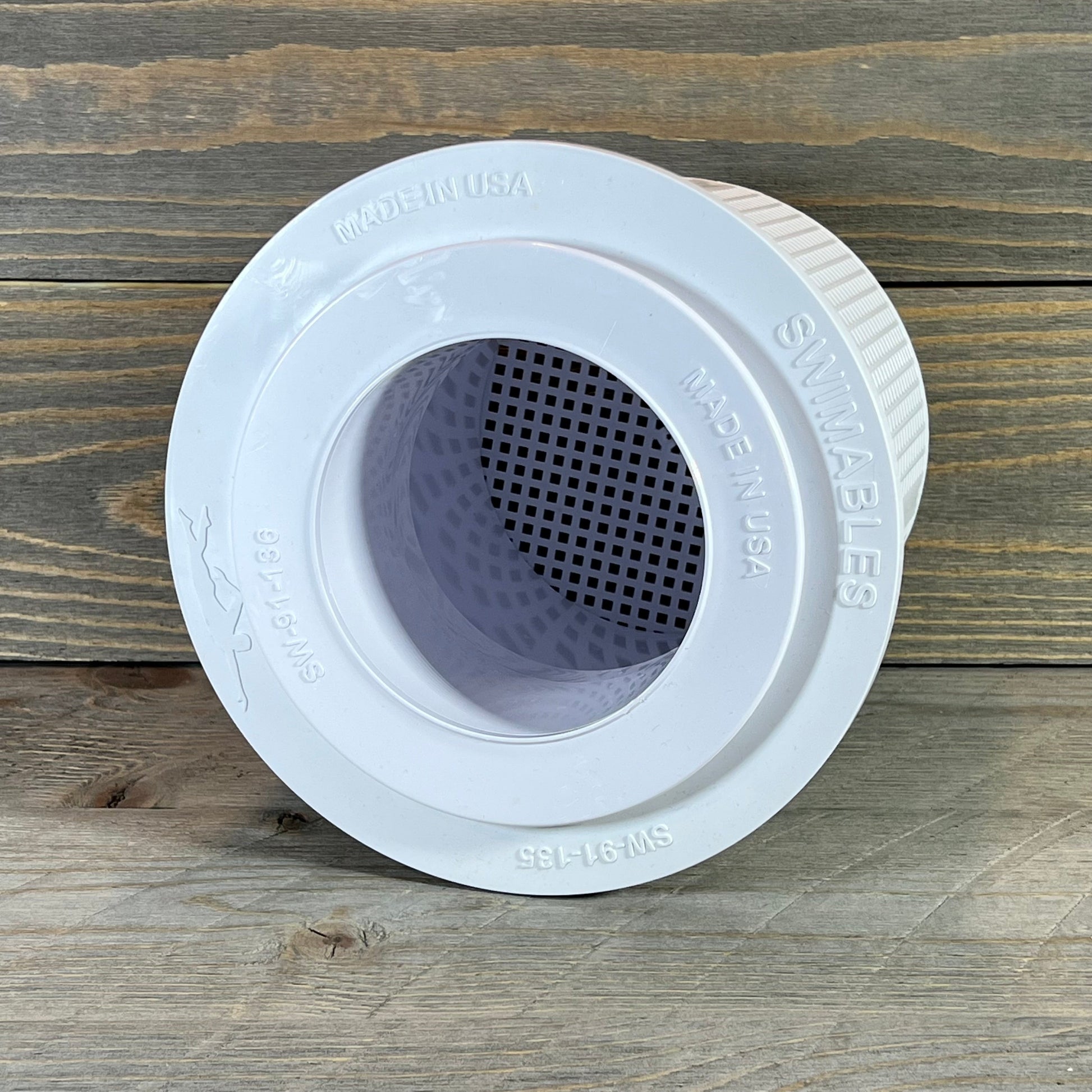 White replacement pool skimmer basket for Pentair Admiral, shown on a wooden surface, labeled "Made in USA."