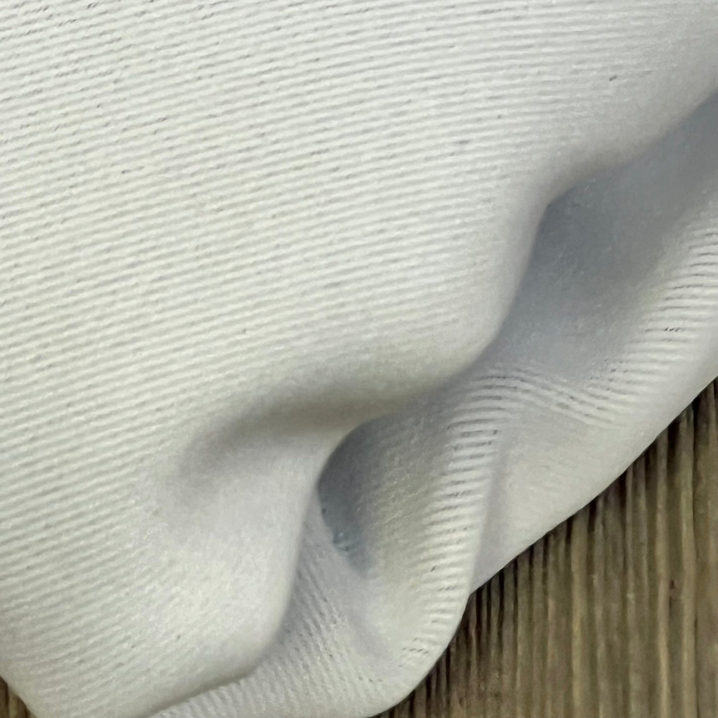 Close-up of RYB HOME greyish white privacy curtain fabric texture, highlighting its noise-reducing, light-blocking properties.