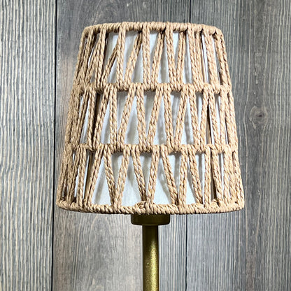 Rattan cordless table lamp with woven shade and gold base, ideal for bedside ambience and stepless dimming features.